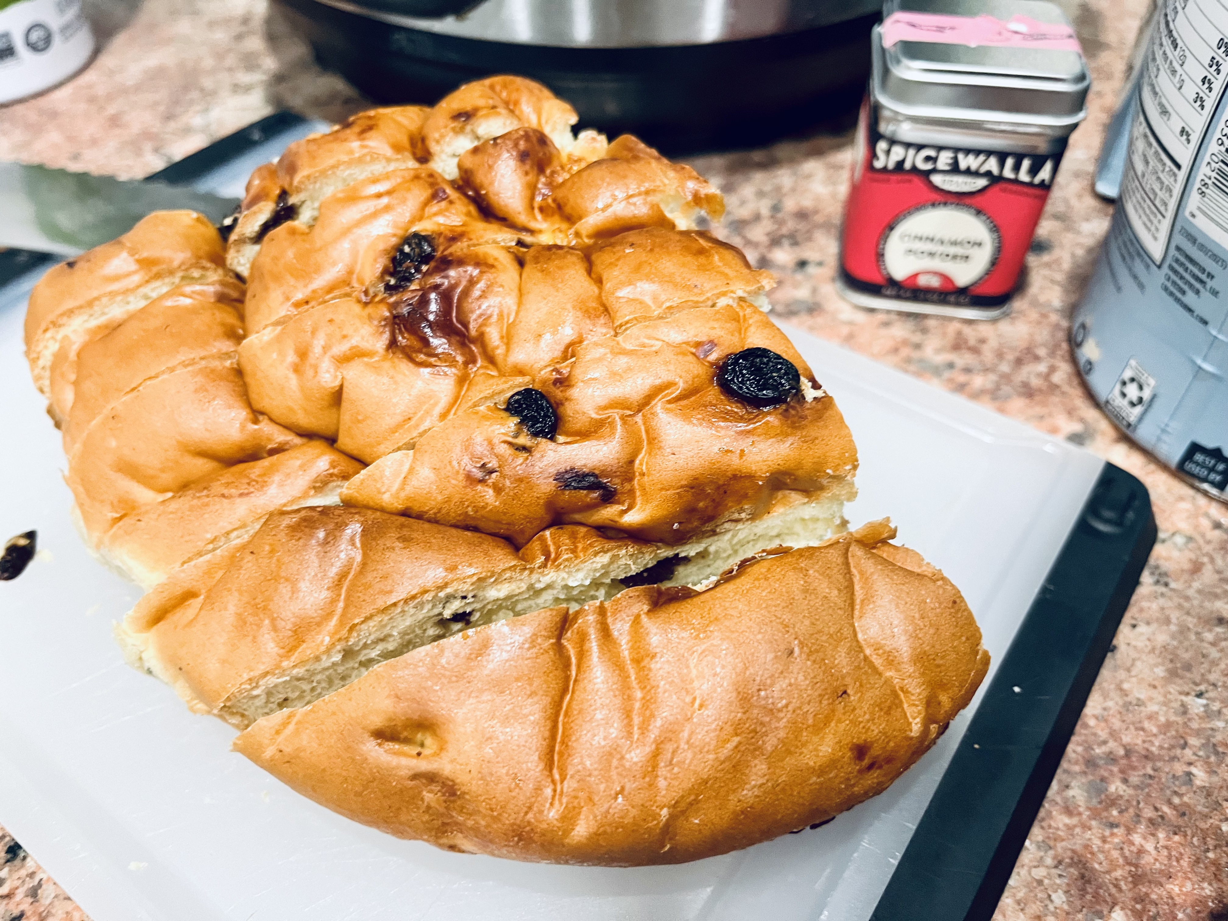 Sliced round raisin challah.